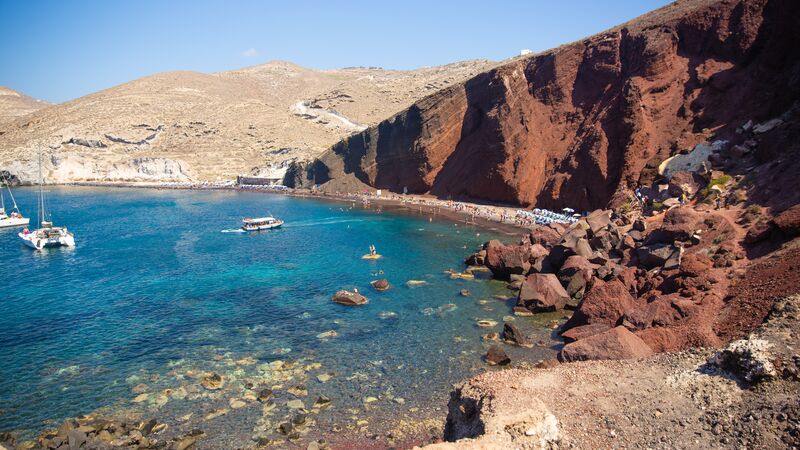 Rocky cliffs around a bay in Greece