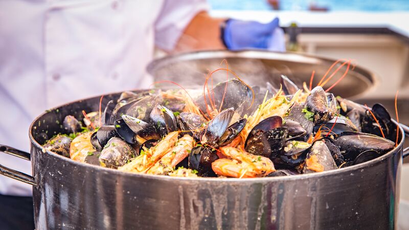 A pot of fresh-cooked seafood.