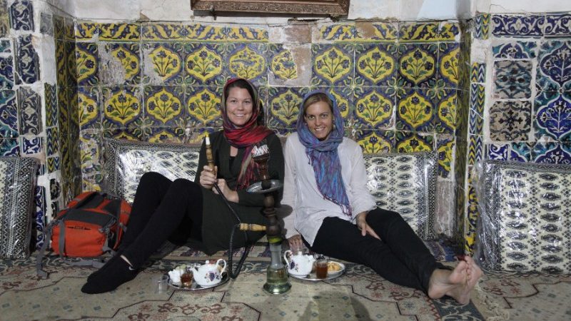 Two women smoking a shisha in Iran