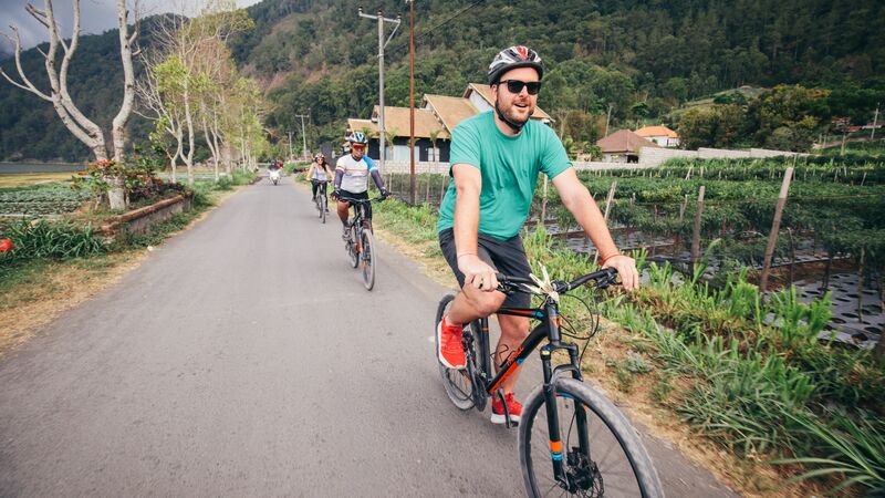 Cycling past villages in Bali. 