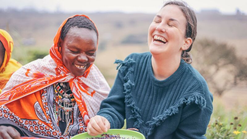 Two women laugh together in Nairobi