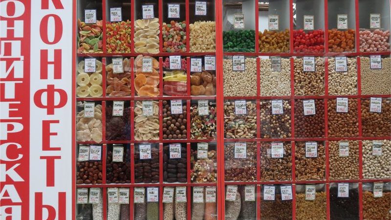 A shop window filled with nuts and lollies