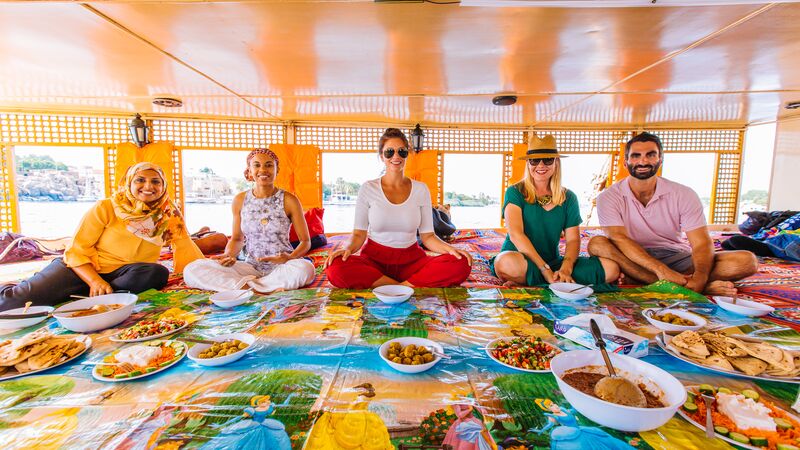 A group of travellers sitting on a boat in Egypt