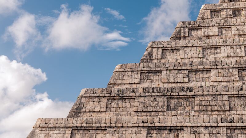 The steps on an ancient ruin in Mexico, with blue sky behind