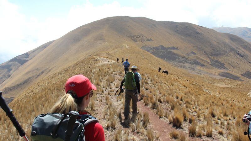 People hiking on a mountain in Peru