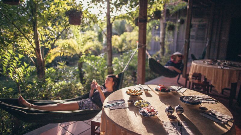 A traveller relaxing in a hammock