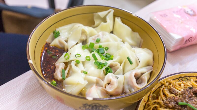 A bowl of dumplings and chilli