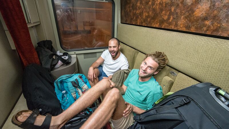 Two young men on a train in Egypt