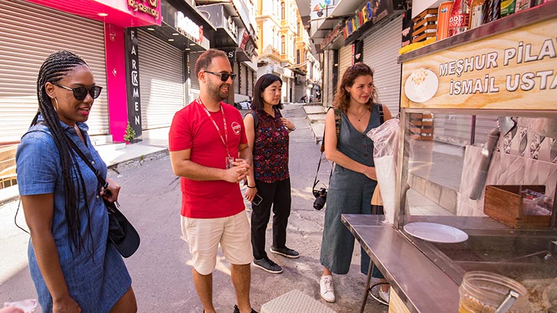 A group of travellers at a market in Istanbul