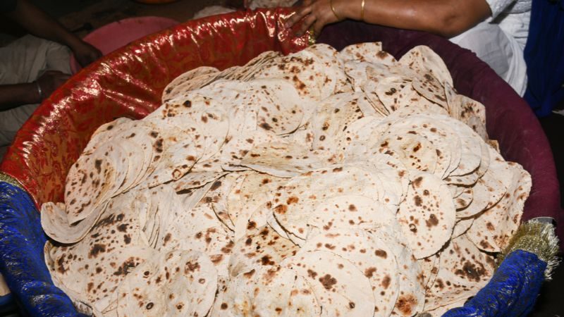 A huge bucket of flat bread, made at a Sikh temple in India