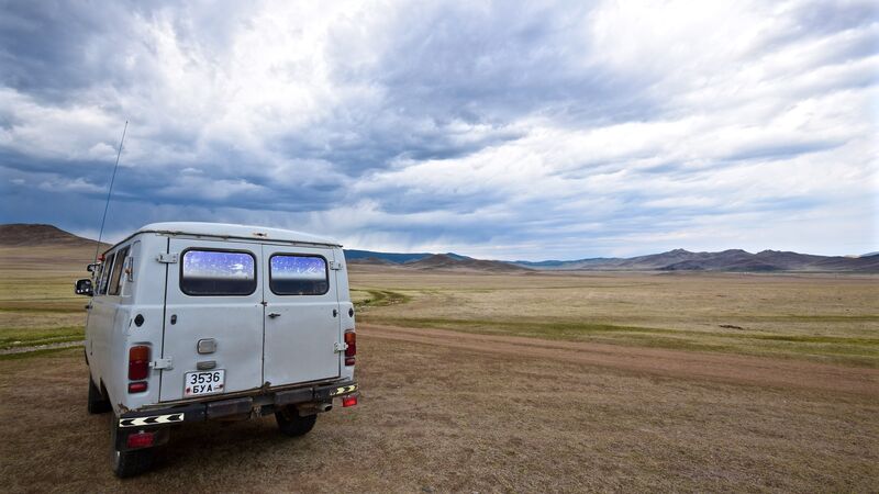 A Russian van driving through Mongolia