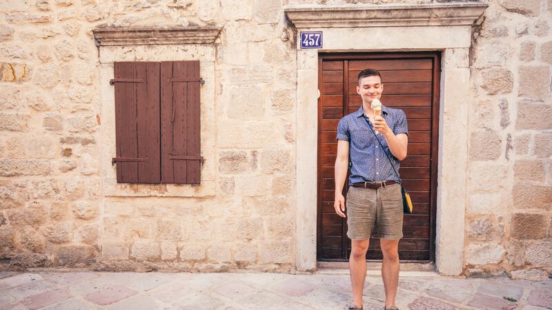 A man eating an ice cream in Montenegro