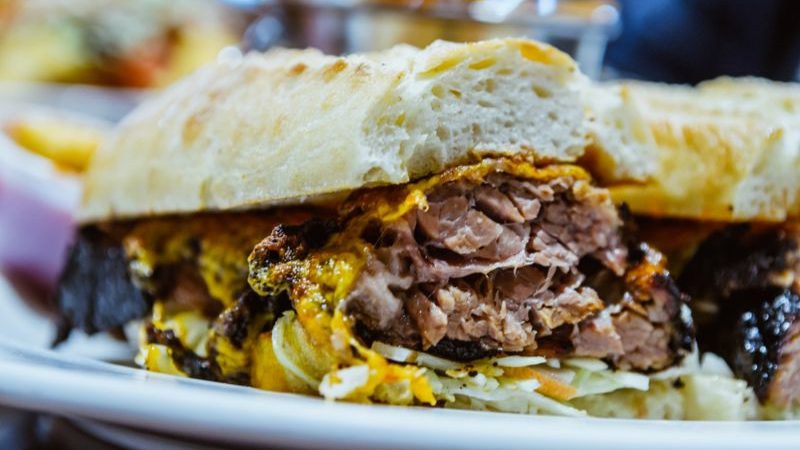 Huge sandwich filled with meat in Montreal