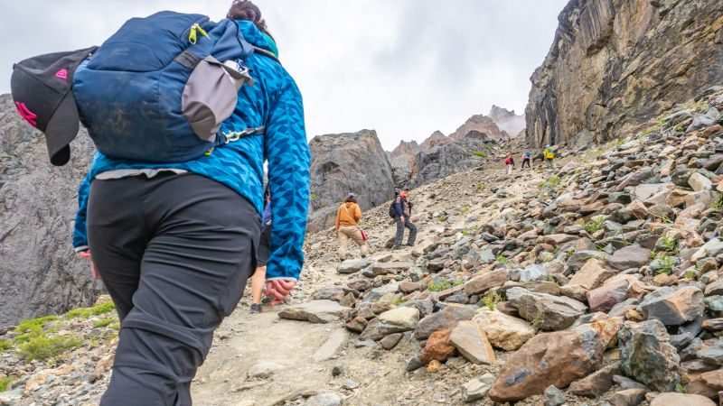 Hikers making their way up a mountain in Russia