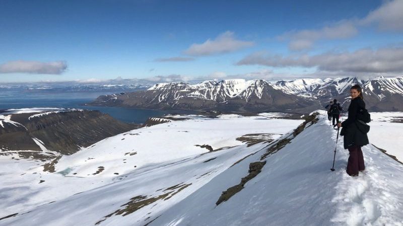 Hikers on a mountain in Svalbard