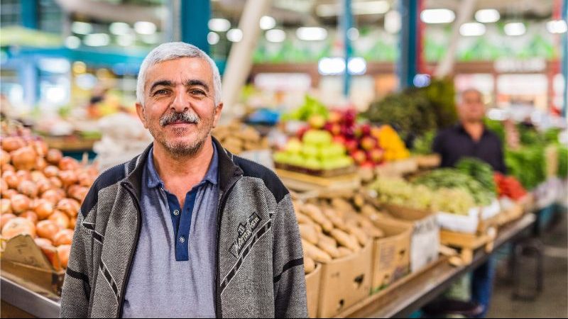 A stallholder in a fruit market in Baku, Azerbaijan