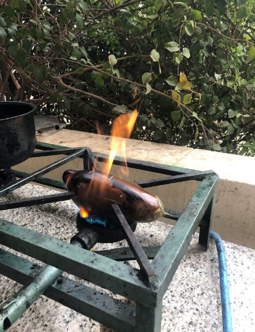 An eggplant on a stove