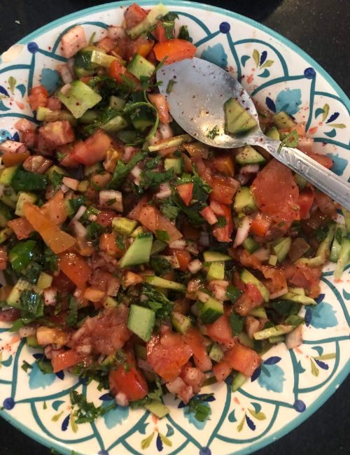 A cucumber and tomato salad. 