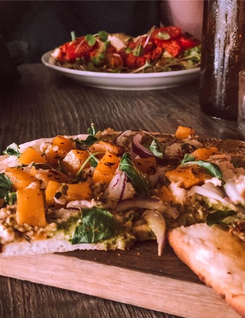 A pizza and a salad.