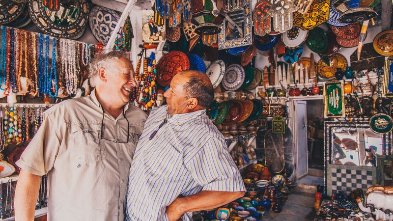 Two men in a shop in Morocco.