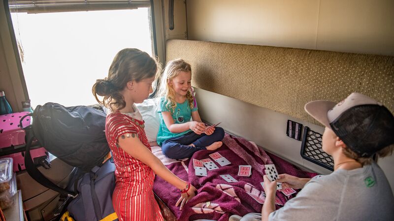 Three kids on a train in Egypt