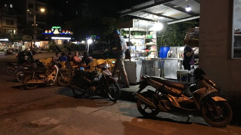 A street food stand at night