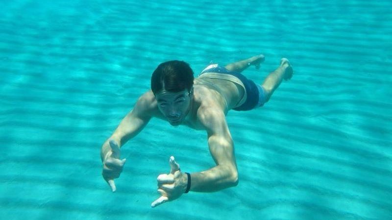 A man swimming underwater