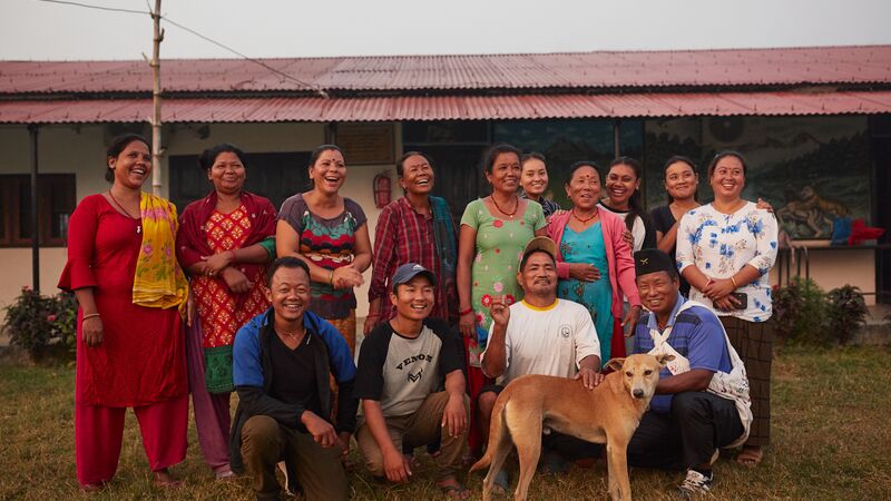 A group of people and a dog in Nepal