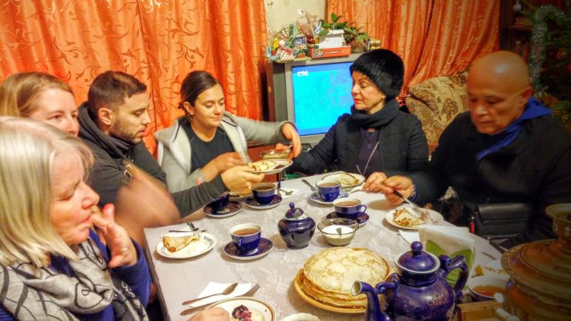 People eating pancakes.