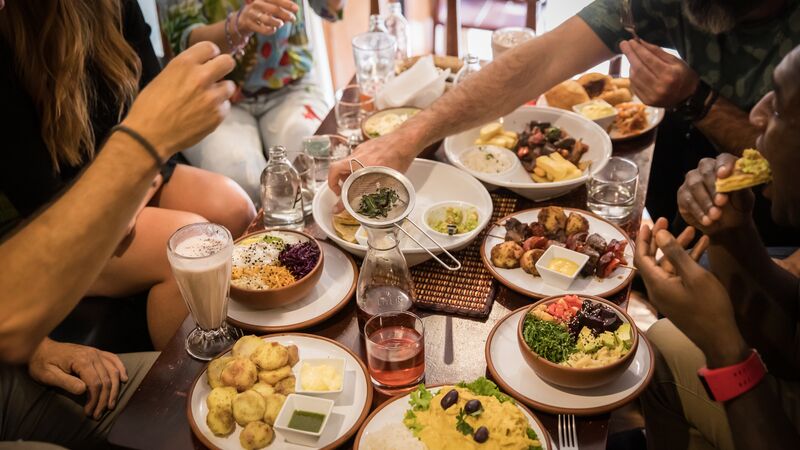 A table covered in delicious-looking Peruvian food