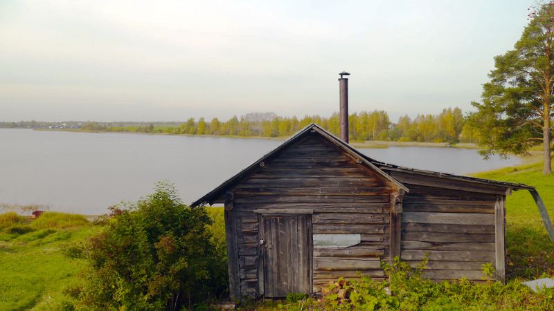 A banya on the banks of a lake. 