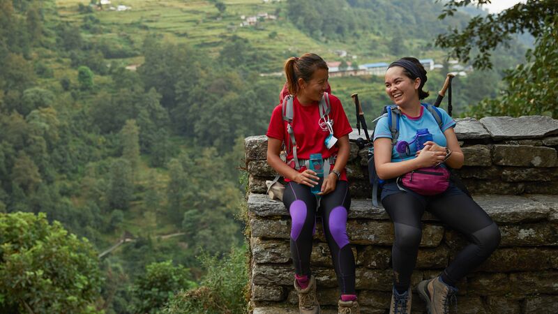 A leader and trekker on a trek in Nepal