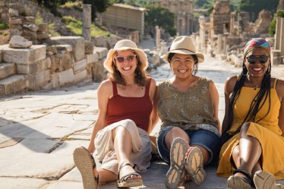 Travellers sitting in Ephesus, Turkey