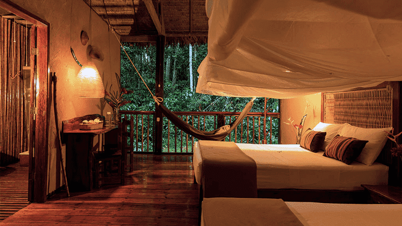 Swing away in your bedroom hammock in an eco-lodge in Peru.