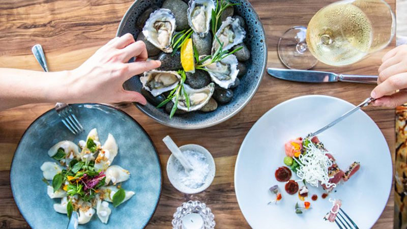 A birds eye shot of a selection of seafood from Melaleuca, a restaurant in Port Douglas.