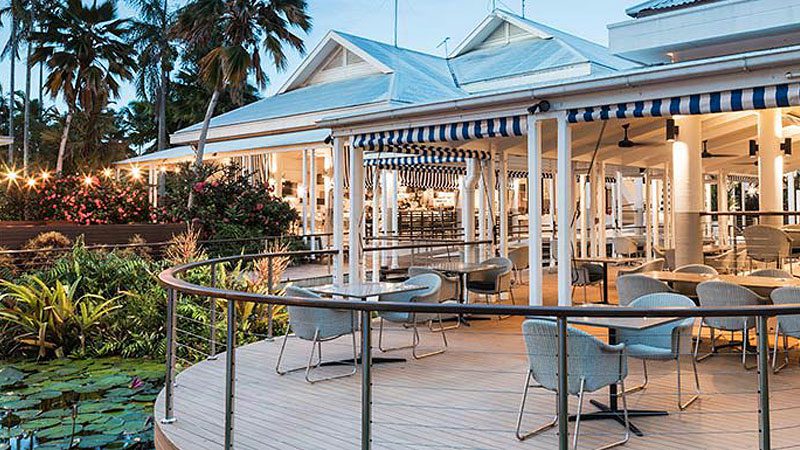 The stunning indoor/outdoor dining room at Oak and Vine restaurant in Port Douglas.