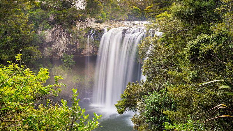 The cascading water from Rainbow Falls in the Bay of Islands, New Zealand.