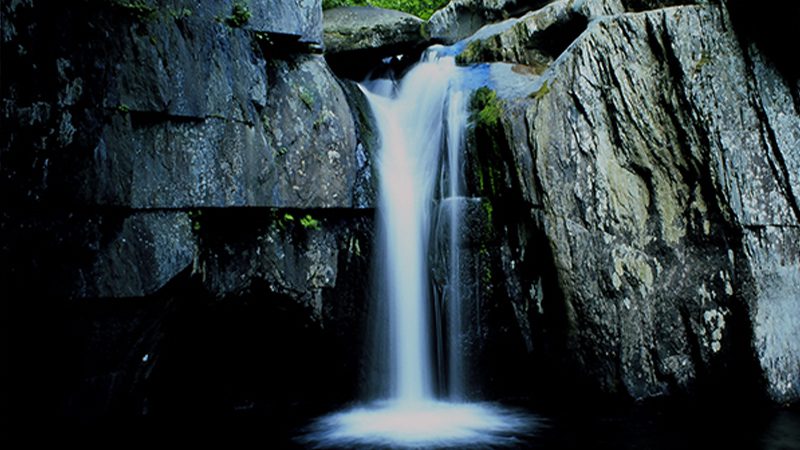 The flowing water of Gulf Hagas Falls in Piscataquis County, Maine.