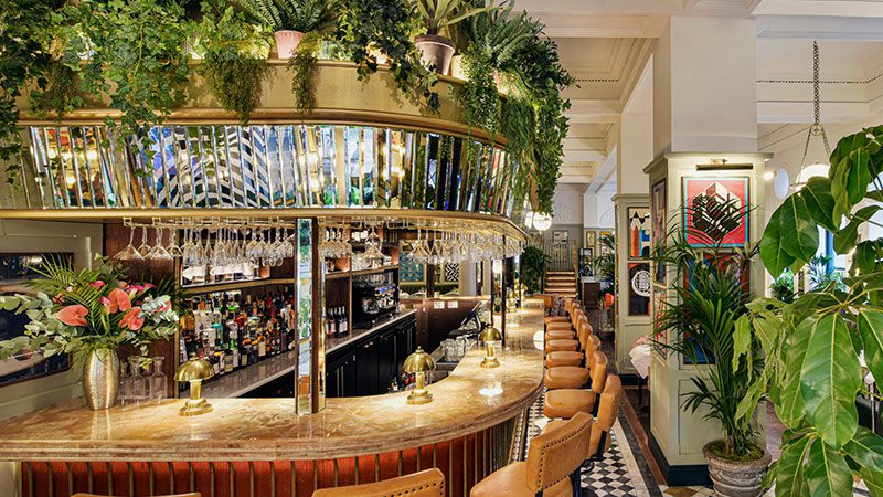 The lavish and glamourous interior of the bar at The Ivy. 
