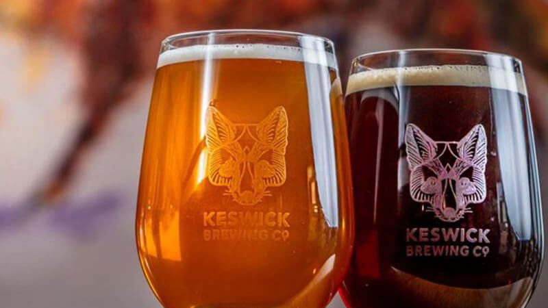 Two glasses of craft beer from Keswick Brewery