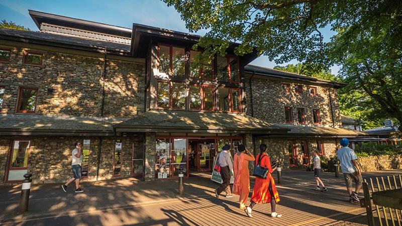 People walking into Theatre by the Lake in Keswick