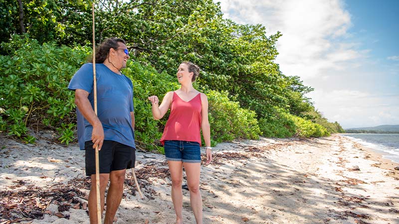 Traveller talking to First Nations person in the Daintree.