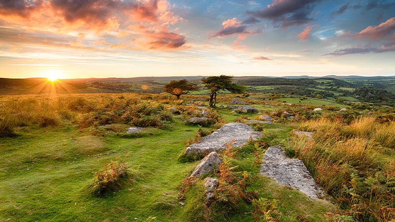The sun setting over Dartmoor National Park
