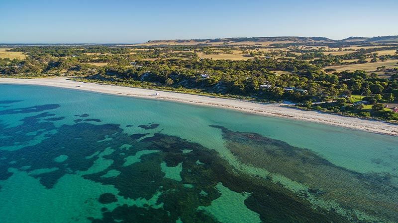 An aerial view of Emu Bay with amazing water visibility