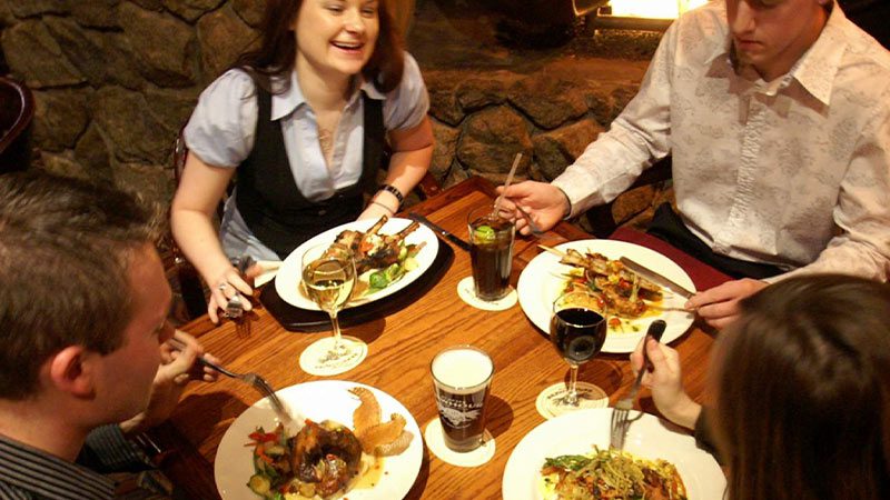 Diners enjoying a meal at Glacier Brewhouse in Anchorage