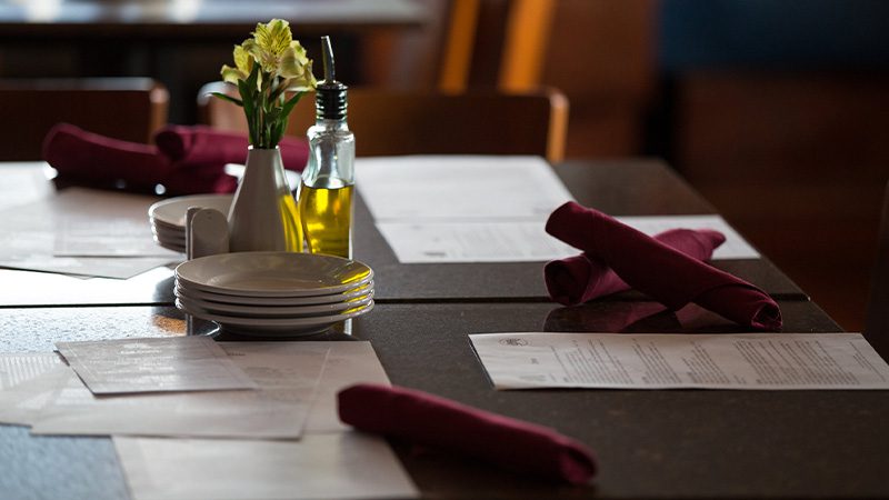 A dinner table and menus at Kinley's Restaurant & Bar in Anchorage