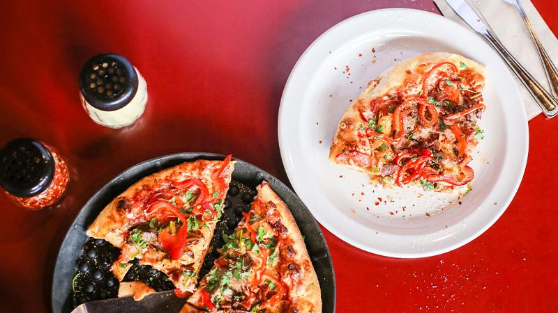 Plates of pizza at Moose's Tooth restaurant in Anchorage