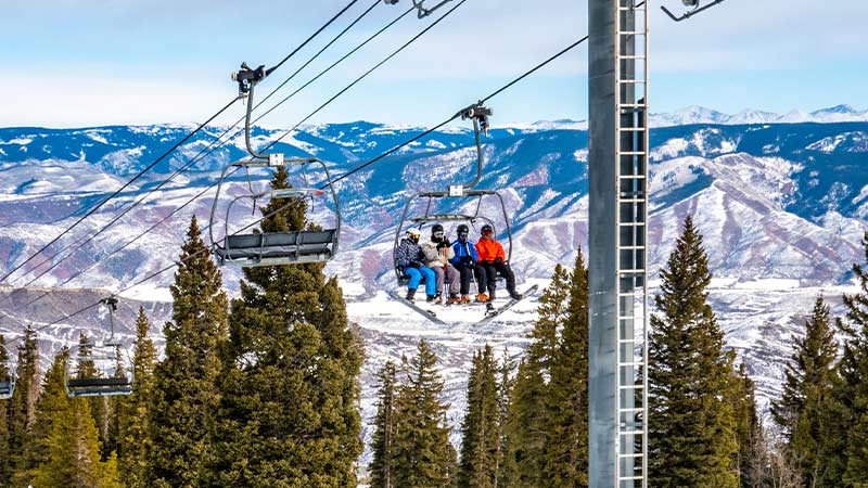 Aspen skiiers on a ski lift