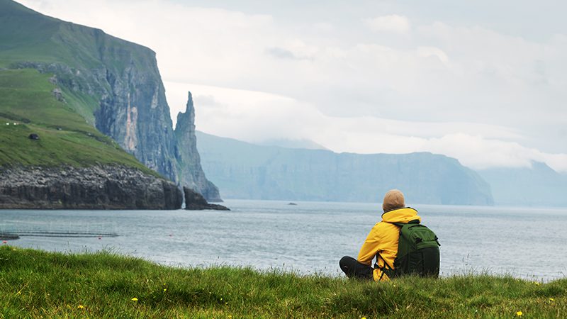 A person admiring the views at Trollkonufingur viewpoint