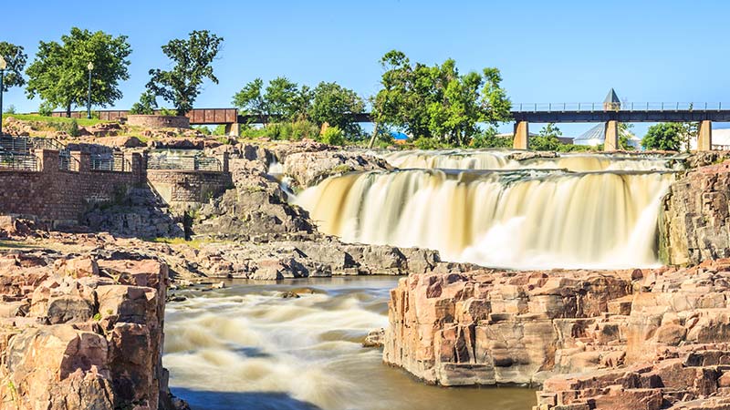 Gushing waterfall in Sioux Falls on a sunny day in South Dakota